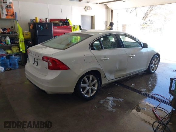 2016 Volvo S60 T5 Drive-E Premier with VIN YV126MFKXG2410966, listed as a IAAI auction lot 41308772 with 262,816 mi miles. Bid and sale history available at carsss.com. Image 4.