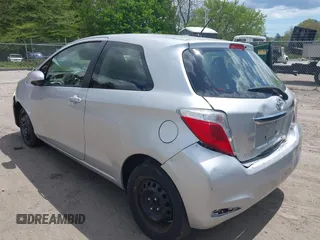 2014 Toyota Yaris L with VIN JTDJTUD38ED587118, listed as a IAAI auction lot 42211424 with 94,616 mi miles and . Bid and sale history available at DreamBid. Image 3.