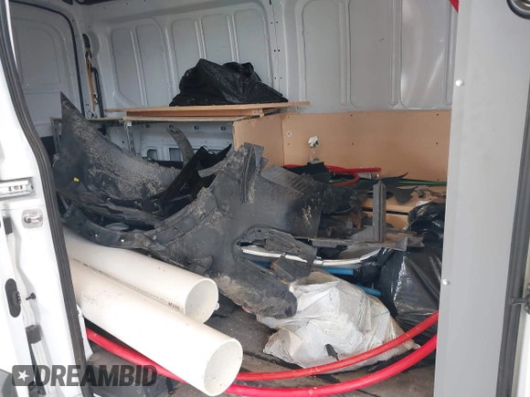 2024 Ford Transit Cargo with VIN 1FTBR2C82RKA94637, listed as a IAAI auction lot 41829528 with 16,901 mi miles and . Bid and sale history available at DreamBid. Image 8.