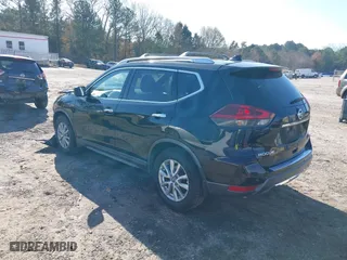 2019 Nissan Rogue SV with VIN KNMAT2MTXKP509941, listed as a IAAI auction lot 41125153 with 105,061 mi miles. Bid and sale history available at carsss.com. Image 3.