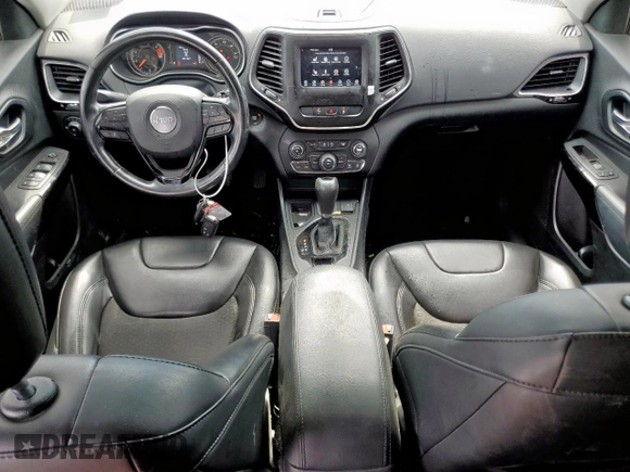 2021 Jeep Cherokee Altitude with VIN 1C4PJLLB0MD215189, listed as a Copart auction lot 61094535 with 88,449 mi miles and Salvage title. Bid and sale history available at DreamBid. Image 8.