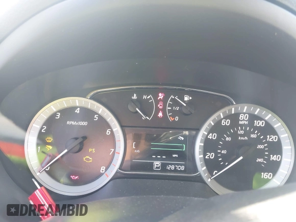 2015 Nissan Sentra SR with VIN 3N1AB7AP4FY301598, listed as a IAAI auction lot 41450677 with 128,708 mi miles and . Bid and sale history available at DreamBid. Image 7.