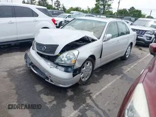 2001 Lexus LS 430 with VIN JTHBN30F110026221, listed as a IAAI auction lot 42022976 with 142,418 mi miles. Bid and sale history available at carsss.com. Image 17.