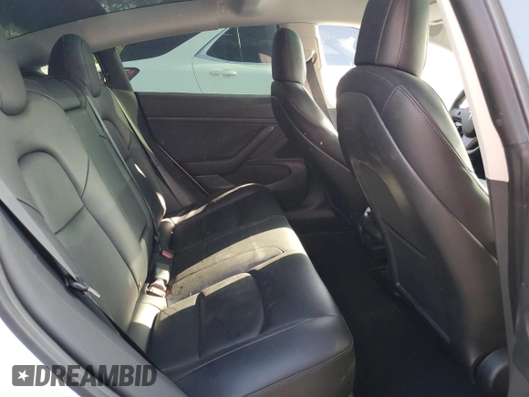 2021 Tesla Model 3 Standard Range Plus z VIN 5YJ3E1EA3MF855031, wystawiony jako Copart lot #51135295 z przebiegiem 41 488 mil mil oraz Szkody całkowita. Historia ofert i sprzedaży dostępna na DreamBid. Obrazek 10.