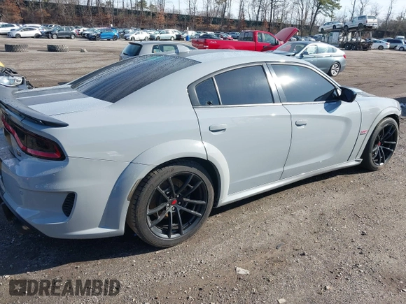 2022 Dodge Charger Scat Pack Widebody with VIN 2C3CDXGJ6NH176650, listed as a IAAI auction lot 41863122 with 34,569 mi miles and . Bid and sale history available at DreamBid. Image 4.