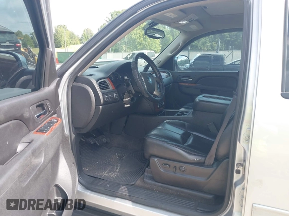 2012 Chevrolet Tahoe LT with VIN 1GNSKBE03CR124911, listed as a IAAI auction lot 40066894 with 151,551 mi miles and . Bid and sale history available at DreamBid. Image 5.