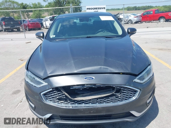 2020 Ford Fusion Titanium with VIN 3FA6P0D9XLR131042, listed as a IAAI auction lot 42560444 with 95,351 mi miles and . Bid and sale history available at DreamBid. Image 12.