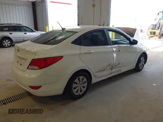 2016 Hyundai Accent SE z VIN KMHCT4AE4GU989554, wystawiony jako IAAI lot #42392926 z przebiegiem 114 759 mil mil oraz . Historia ofert i sprzedaży dostępna na DreamBid. Obrazek 4.