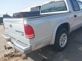 2003 Dodge Dakota SLT with VIN 1D7HL48N83S236590, listed as a IAAI auction lot 41796103 with 221,667 mi miles. Bid and sale history available at carsss.com. Image 6.