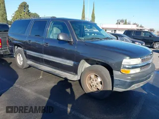 2003 Chevrolet Suburban LS with VIN 3GNEC16T83G233894, listed as a IAAI auction lot 41339503 with 201,076 mi miles. Bid and sale history available at carsss.com. Image 1.