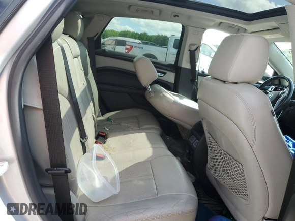 2013 Cadillac SRX Performance Collection with VIN 3GYFNHE37DS645878, listed as a Copart auction lot 55489525 with Not provided miles and Salvage title. Bid and sale history available at DreamBid. Image 11.