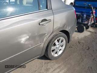 2008 Nissan Sentra S z VIN 3N1AB61E38L626610, wystawiony jako IAAI lot #42650176 z przebiegiem 184 562 mil mil oraz . Historia ofert i sprzedaży dostępna na DreamBid. Obrazek 13.