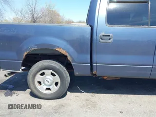 2004 Ford F-150 XLT with VIN 1FTRW14W24KA27415, listed as a IAAI auction lot 42081888 with 149,897 mi miles. Bid and sale history available at carsss.com. Image 6.