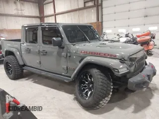 2020 Jeep Gladiator Rubicon with VIN 1C6JJTBG1LL214681, listed as a IAAI auction lot 41979666 with 23,811 mi miles and . Bid and sale history available at DreamBid. Image 1.