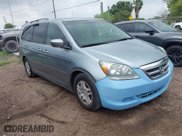 2005 Honda Odyssey EX with VIN 5FNRL38415B104920, listed as a IAAI auction lot 42094690 with 228,538 mi miles. Bid and sale history available at carsss.com. Image 1.
