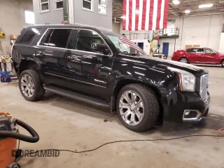 2016 GMC Yukon Denali with VIN 1GKS2CKJ8GR402482, listed as a Copart auction lot 69753434 with 160,816 mi miles and Salvage Title. Bid and sale history available at carsss.com. Image 4.