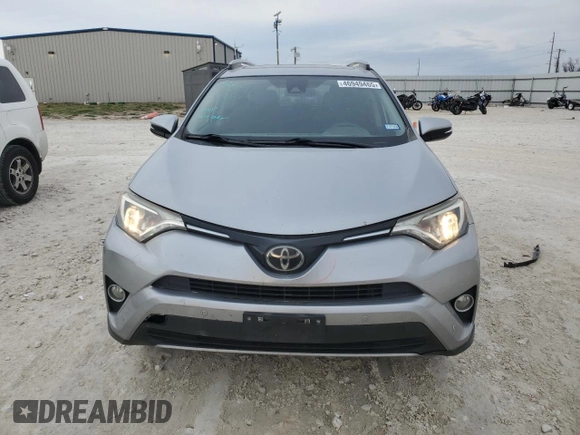 2018 Toyota RAV4 XLE with VIN JTMWFREV3JJ180152, listed as a Copart auction lot 46949465 with 103,346 mi miles and Clean Title. Bid and sale history available at DreamBid. Image 5.