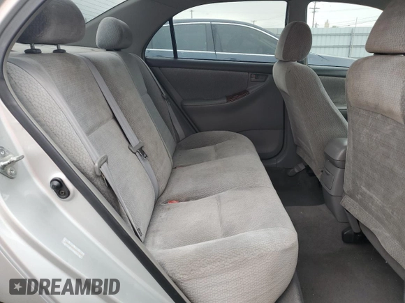 2004 Toyota Corolla CE with VIN 1NXBR32E34Z297414, listed as a Copart auction lot 52541105 with 147,072 mi miles and Salvage Title. Bid and sale history available at DreamBid. Image 10.