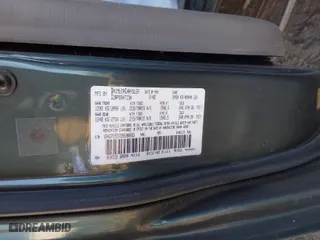 2002 Dodge Caravan SE with VIN 1B4GP25372B698863, listed as a IAAI auction lot 41508749 with 151,578 mi miles. Bid and sale history available at carsss.com. Image 9.