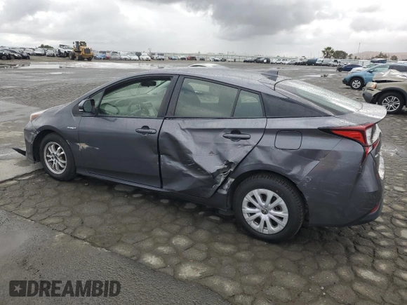 2020 Toyota Prius L Eco с VIN JTDKARFU1L3121224, выставлен на аукционе Copart как лот 56697845 с пробегом 94 621 миль миль и Списание • Salvage title. История ставок и продаж доступна на DreamBid. Изображение 2.