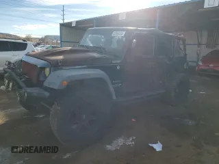 2013 Jeep Wrangler Unlimited Sport z VIN 1C4BJWDG7DL689054, wystawiony jako Copart lot #82568434 z przebiegiem 108 598 mil mil oraz Szkody całkowita. Historia ofert i sprzedaży dostępna na DreamBid. Obrazek 1.