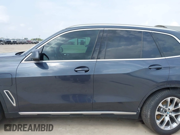 2021 BMW X5 xDrive45e with VIN 5UXTA6C04M9D34382, listed as a IAAI auction lot 42080996 with 24,638 mi miles and . Bid and sale history available at DreamBid. Image 14.