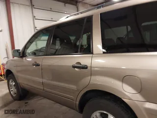 2004 Honda Pilot EX with VIN 2HKYF18464H567384, listed as a IAAI auction lot 41790773 with 142,534 mi miles. Bid and sale history available at carsss.com. Image 15.