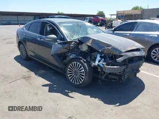 2017 Ford Fusion Titanium z VIN 3FA6P0SU9HR354591, wystawiony jako IAAI lot #42489233 z przebiegiem Nie podano mil oraz . Historia ofert i sprzedaży dostępna na DreamBid. Obrazek 1.