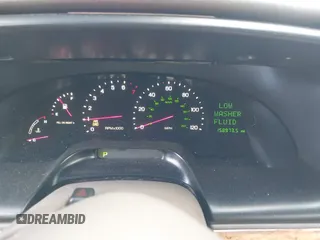 1998 Lincoln Continental with VIN 1LNFM97VXWY619313, listed as a IAAI auction lot 41477852 with 158,973 mi miles. Bid and sale history available at carsss.com. Image 7.