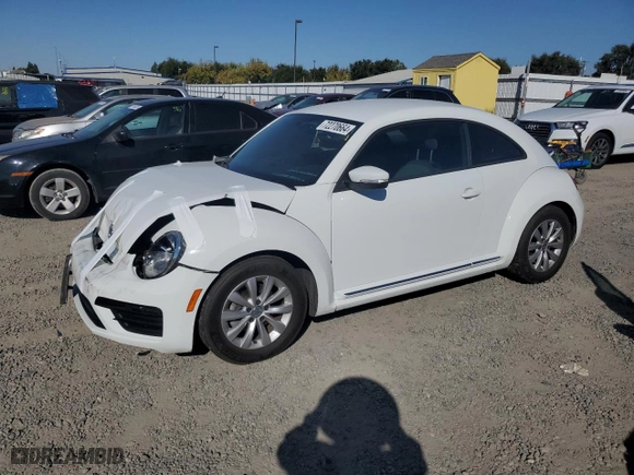 2019 Volkswagen Beetle S with VIN 3VWFD7AT3KM710393, listed as a Copart auction lot 72270664 with 63,627 mi miles and Salvage Title. Bid and sale history available at carsss.com. Image 1.