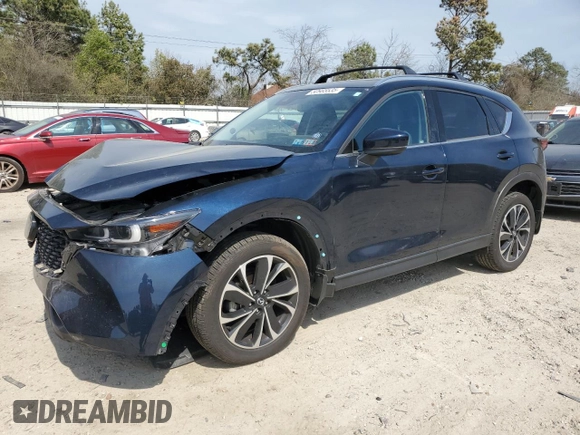 2022 Mazda CX-5 2.5 S Premium Package with VIN JM3KFBDMXN0559814, listed as a Copart auction lot 50985535 with 34,612 mi miles and Salvage Title. Bid and sale history available at carsss.com. Image 1.