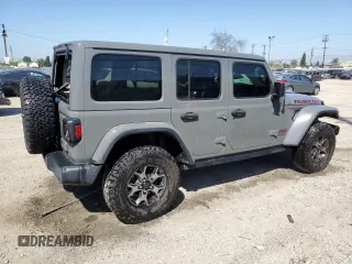 2019 Jeep Wrangler Unlimited Rubicon with VIN 1C4HJXFN1KW502477, listed as a Copart auction lot 52441455 with 53,110 mi miles and Salvage title. Bid and sale history available at DreamBid. Image 3.