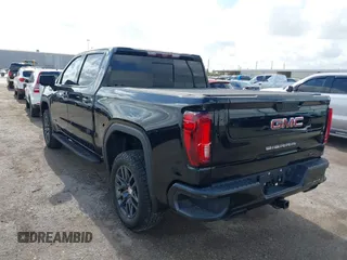 2021 GMC Sierra 1500 AT4 z VIN 1GTP9EELXMZ304412, wystawiony jako IAAI lot #41069878 z przebiegiem 48 987 mil mil oraz . Historia ofert i sprzedaży dostępna na DreamBid. Obrazek 3.