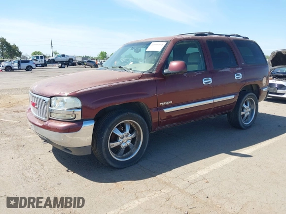 2001 GMC Yukon SLT with VIN 1GKEK13V81J100005, listed as a IAAI auction lot 42090494 with 276,042 mi miles. Bid and sale history available at carsss.com. Image 2.