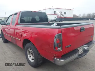 1998 Ford F-150 with VIN 1FTZX17WXWNC05002, listed as a IAAI auction lot 41799463 with 157,453 mi miles and . Bid and sale history available at DreamBid. Image 3.