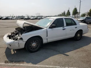 2007 Ford Crown Victoria LX z VIN 2FAFP74V47X119952, wystawiony jako Copart lot #71025704 z przebiegiem 220 034 mil mil oraz Szkody całkowita. Historia ofert i sprzedaży dostępna na DreamBid. Obrazek 1.