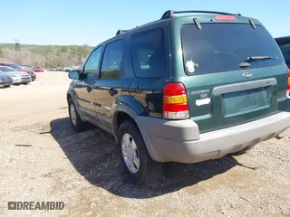 2001 Ford Escape XLT with VIN 1FMCU03121KF56950, listed as a IAAI auction lot 41768628 with 265,069 mi miles. Bid and sale history available at carsss.com. Image 3.