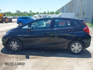 2015 Honda Fit LX z VIN 3HGGK5H56FM712266, wystawiony jako IAAI lot #42378228 z przebiegiem 140 423 mil mil oraz . Historia ofert i sprzedaży dostępna na DreamBid. Obrazek 14.