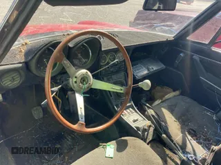 1981 Alfa Romeo Spider Veloce z VIN ZARBA5410B1012836, wystawiony jako IAAI lot #42364544 z przebiegiem Nie podano mil oraz . Historia ofert i sprzedaży dostępna na DreamBid. Obrazek 7.