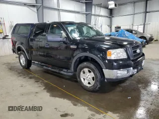 2004 Ford F-150 XLT with VIN 1FTPW14504KB95696, listed as a Copart auction lot 57332215 with 177,558 mi miles and Salvage title. Bid and sale history available at DreamBid. Image 4.