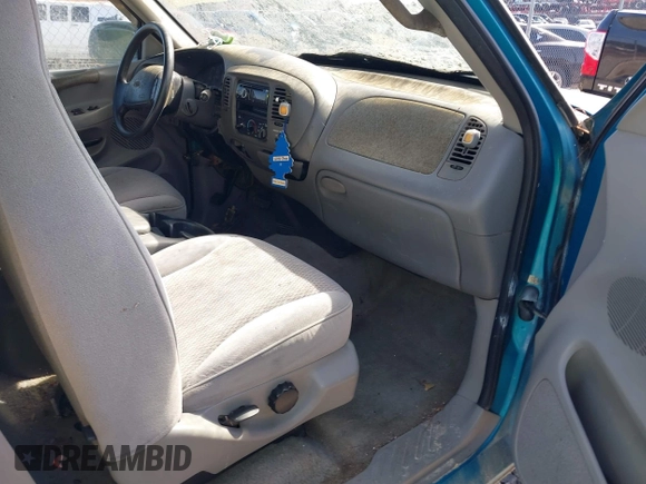 1997 Ford F-150 with VIN 1FTDF1768VNA92419, listed as a IAAI auction lot 41468196 with 91,943 mi miles and . Bid and sale history available at DreamBid. Image 5.