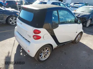 2009 Smart fortwo Passion with VIN WMEEK31X79K270472, listed as a IAAI auction lot 41365417 with 112,367 mi miles. Bid and sale history available at carsss.com. Image 4.