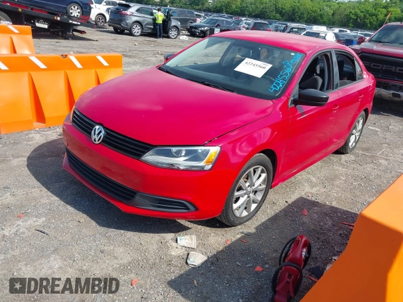 2014 Volkswagen Jetta S z VIN 3VW2K7AJ1EM434223, wystawiony jako IAAI lot #42245560 z przebiegiem 105 411 mil mil oraz . Historia ofert i sprzedaży dostępna na DreamBid. Obrazek 2.