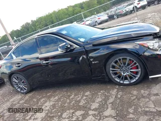 2018 Infiniti Q50 Red Sport 400 with VIN JN1FV7AP0JM461227, listed as a IAAI auction lot 42308384 with 100,694 mi miles and . Bid and sale history available at DreamBid. Image 13.