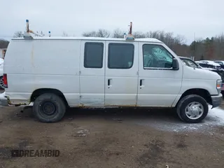 2011 Ford Econoline Cargo Commercial with VIN 1FTNE1EWXBDA35585, listed as a IAAI auction lot 41349320 with 122,311 mi miles and . Bid and sale history available at carsss.com. Image 13.
