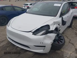 2022 Tesla Model Y Performance with VIN 7SAYGDEF0NF400560, listed as a IAAI auction lot 41783912 with 36,513 mi miles and . Bid and sale history available at DreamBid. Image 6.