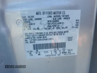 2005 Ford F-150 XL with VIN 1FTRF12W45NB13974, listed as a Copart auction lot 55701635 with 385,185 mi miles and Salvage title. Bid and sale history available at DreamBid. Image 12.