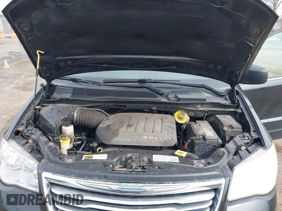 2014 Chrysler Town & Country Touring-L with VIN 2C4RC1CG2ER214952, listed as a IAAI auction lot 42083166 with 188,494 mi miles. Bid and sale history available at carsss.com. Image 10.