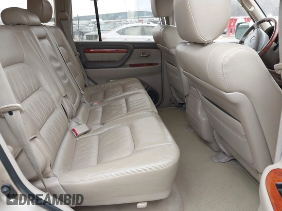 1999 Lexus LX 470 z VIN JT6HT00W8X0045705, wystawiony jako IAAI lot #42005587 z przebiegiem 443 758 mil mil oraz . Historia ofert i sprzedaży dostępna na DreamBid. Obrazek 8.