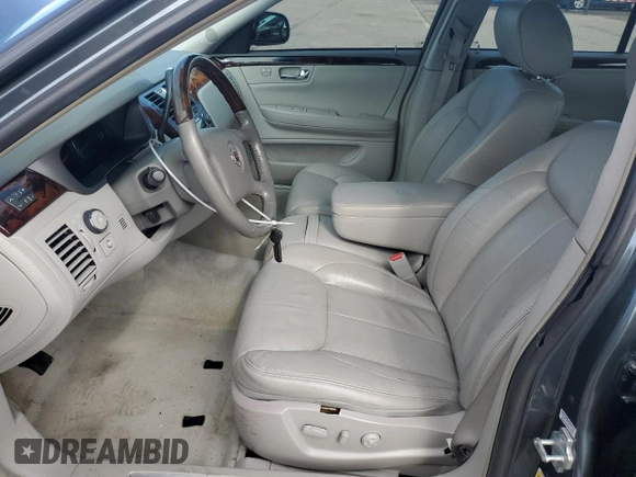 2010 Cadillac DTS w/1SC with VIN 1G6KD5EY6AU133836, listed as a Copart auction lot 46990655 with 112,195 mi miles and Salvage Title. Bid and sale history available at carsss.com. Image 7.